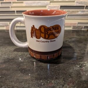 CRACKER BARREL Mug Old Country Store Uncle Herschel Logo Fireplace